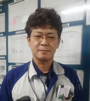 長岡　達也